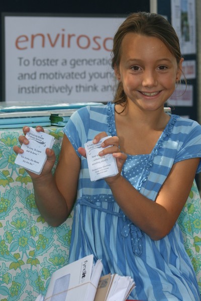 Renee Ash from St Francis Xavier Catholic School with prayer cards made from recycled paper